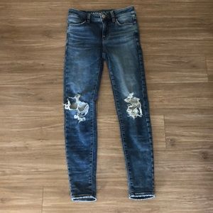 American Eagle ripped blue jeans, size 0